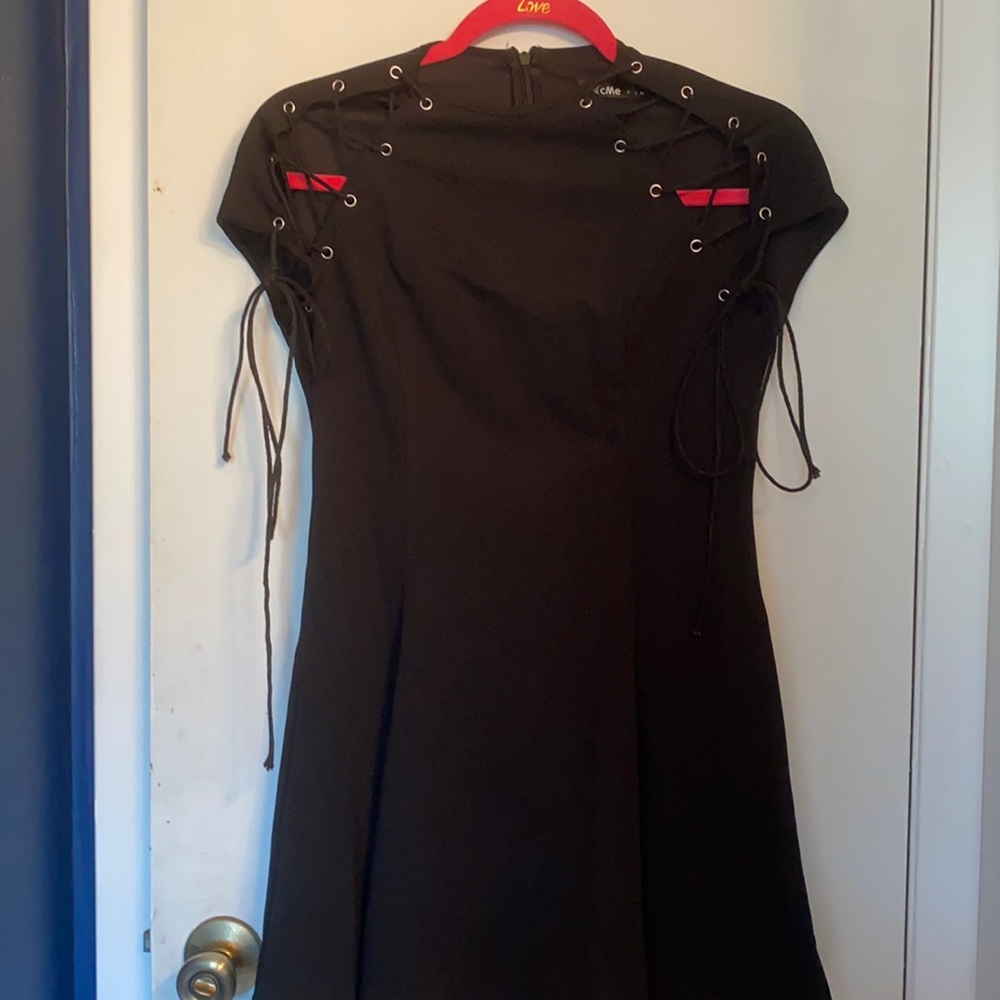 A black shoulder tie dress